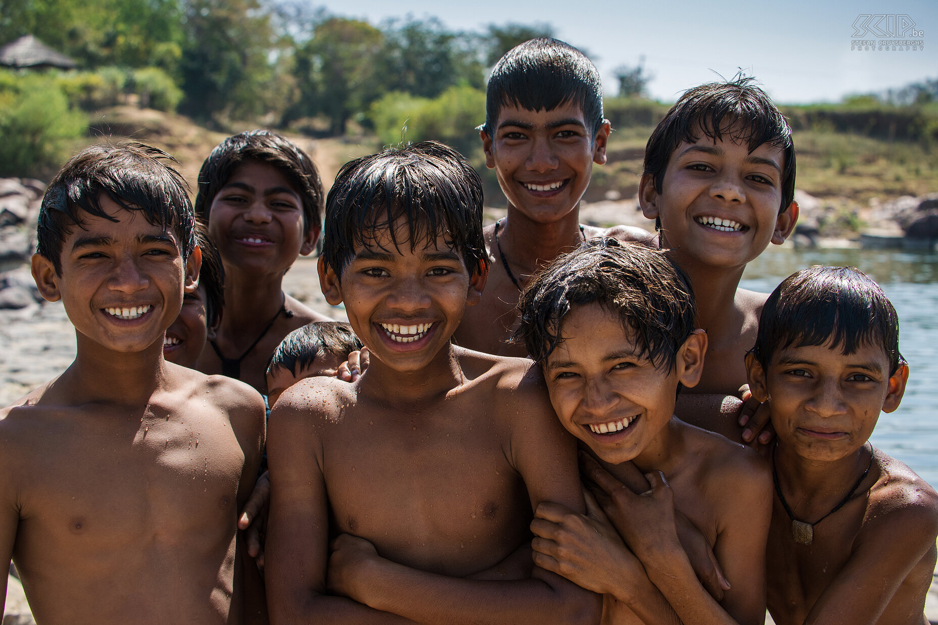 Panna - Laughing boys Launching and enthusiastic young boys who were playing and swimming in the Ken river. Stefan Cruysberghs